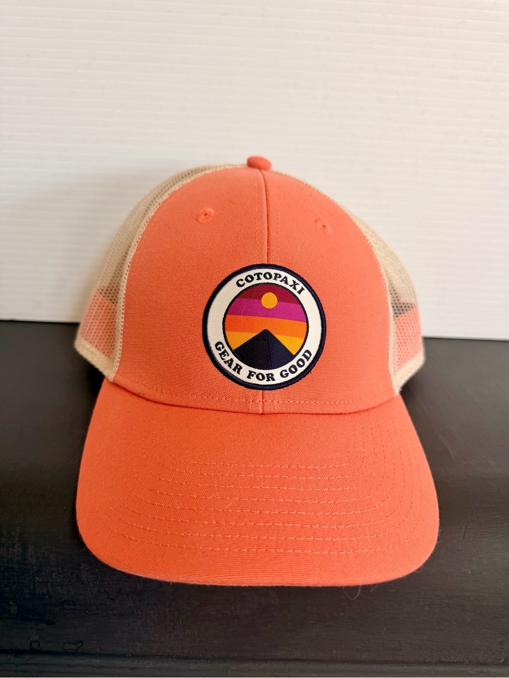 cotopaxi black and orange label